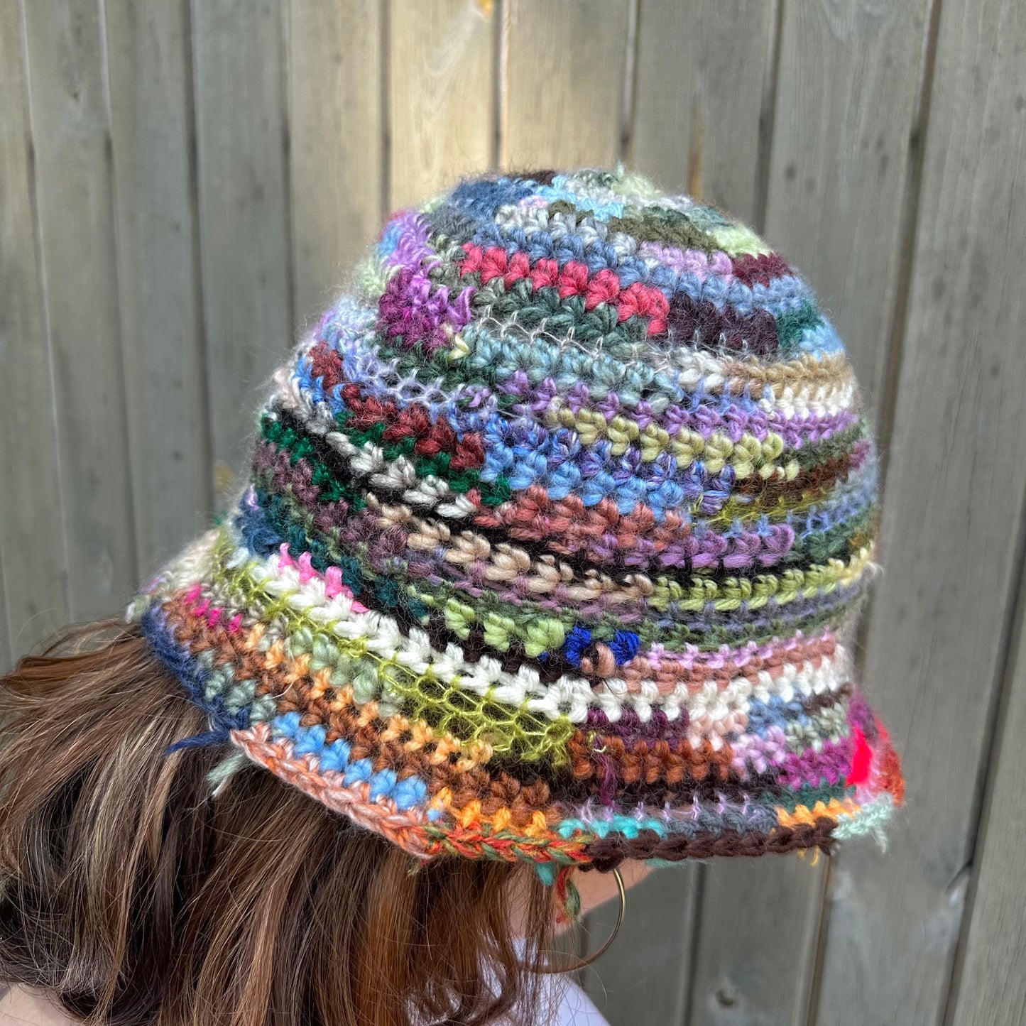 1 of 1 handmade crochet bucket hat made from leftover scraps of yarn