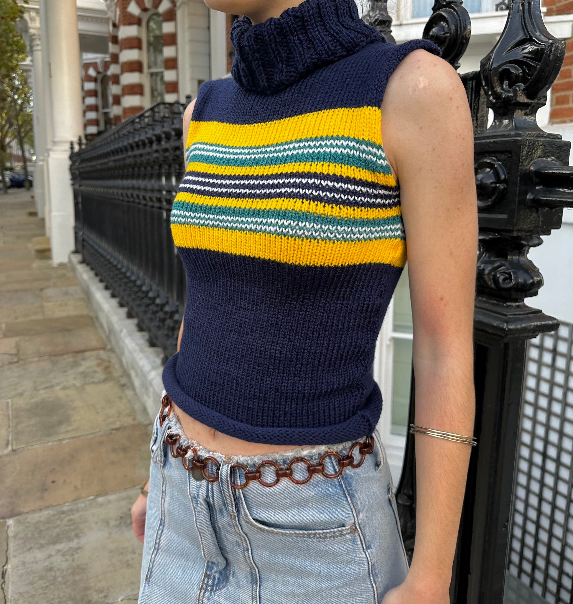 Striped on sale sleeveless turtleneck