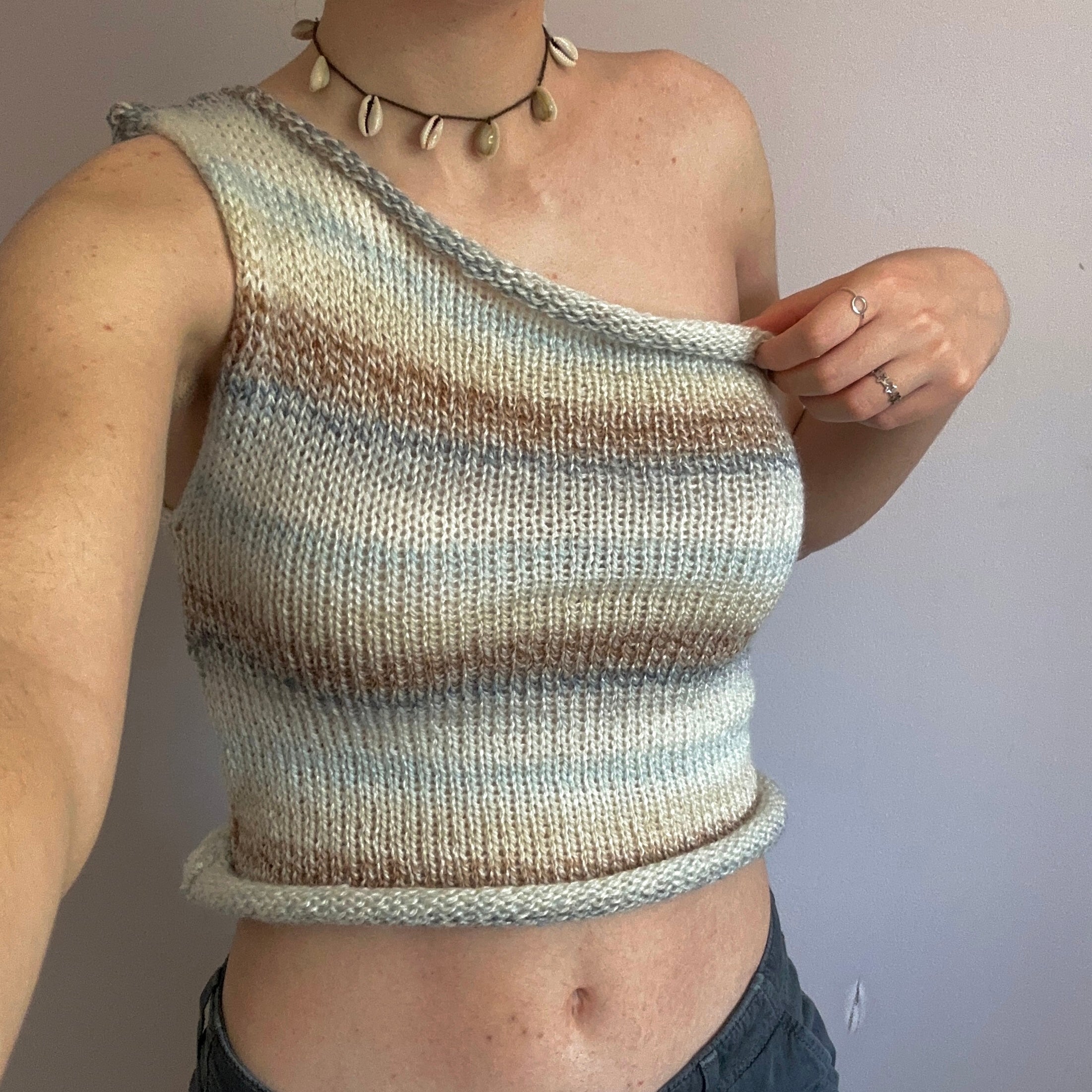 Handmade knitted one shoulder asymmetrical top in cream baby blue and Yarns Truly Shop