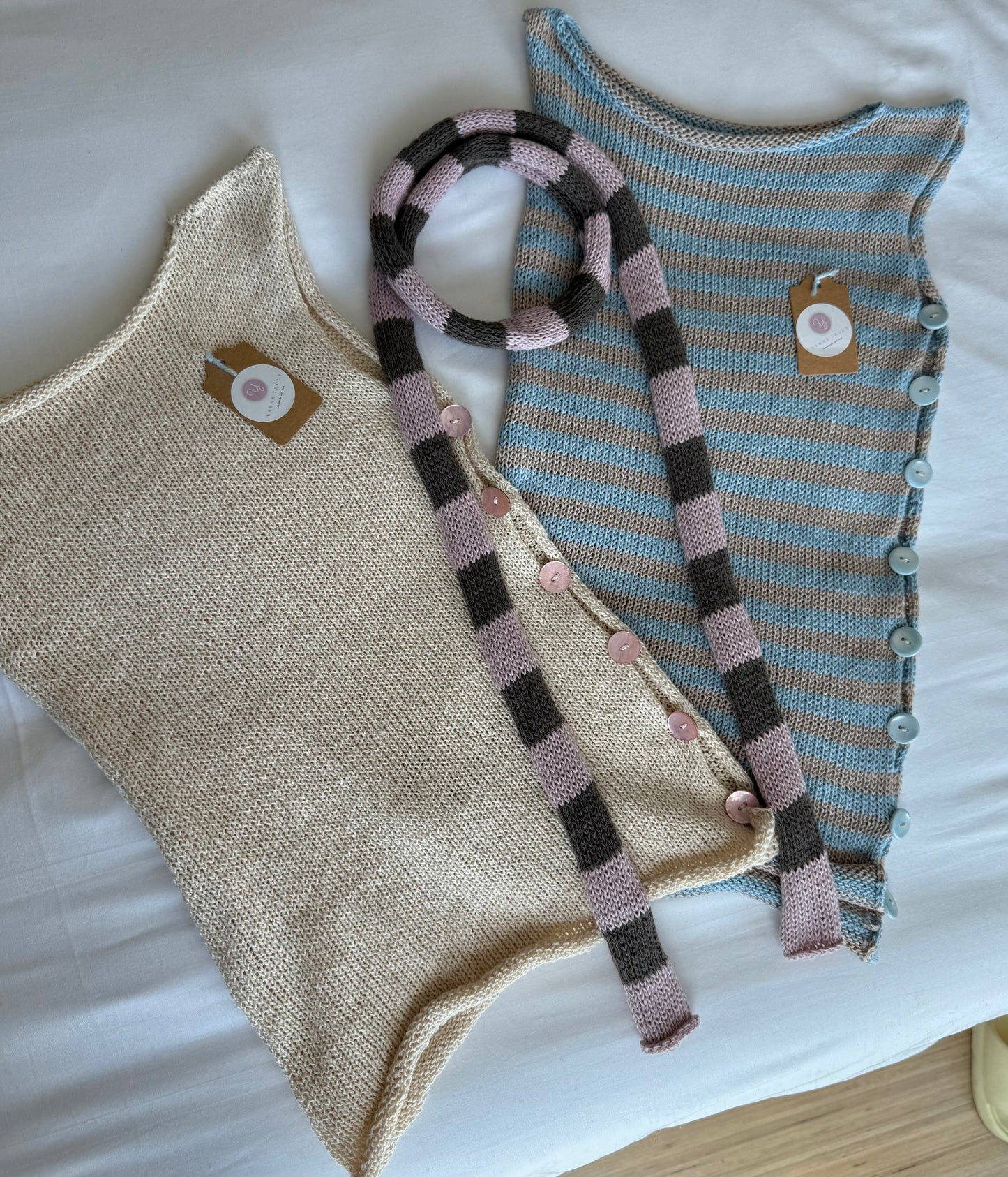 Handmade knitted Pearl Vest in cream with baby pink mother of pearl buttons