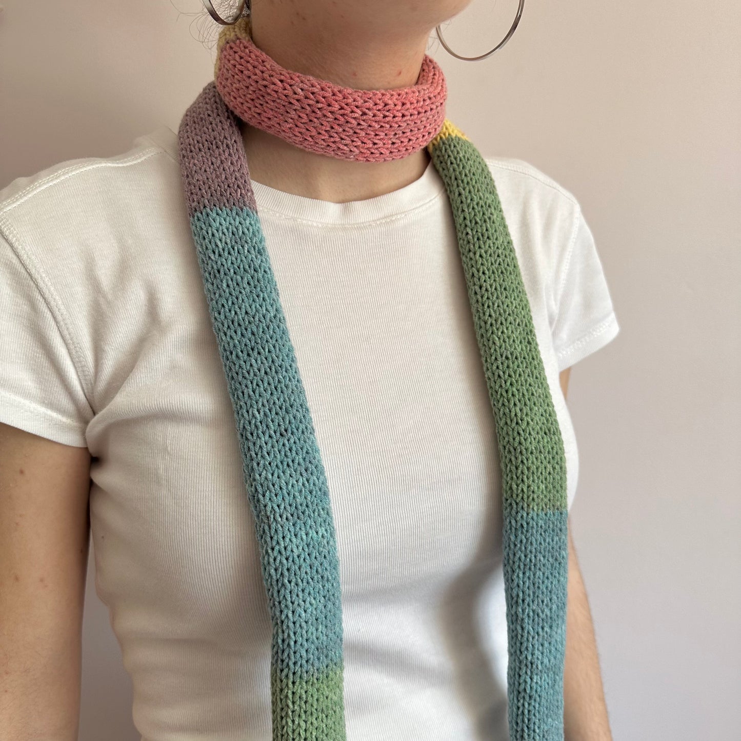 Handmade knitted colour block skinny scarf in dusky rainbow