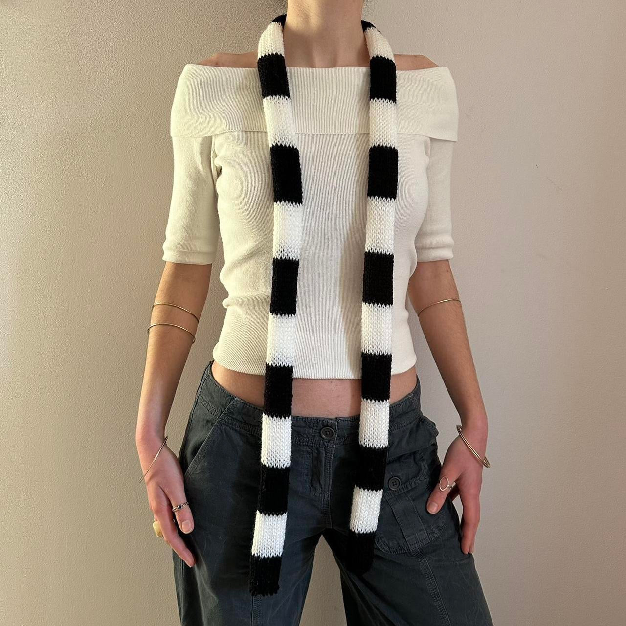 Handmade knitted striped skinny scarf in black and white