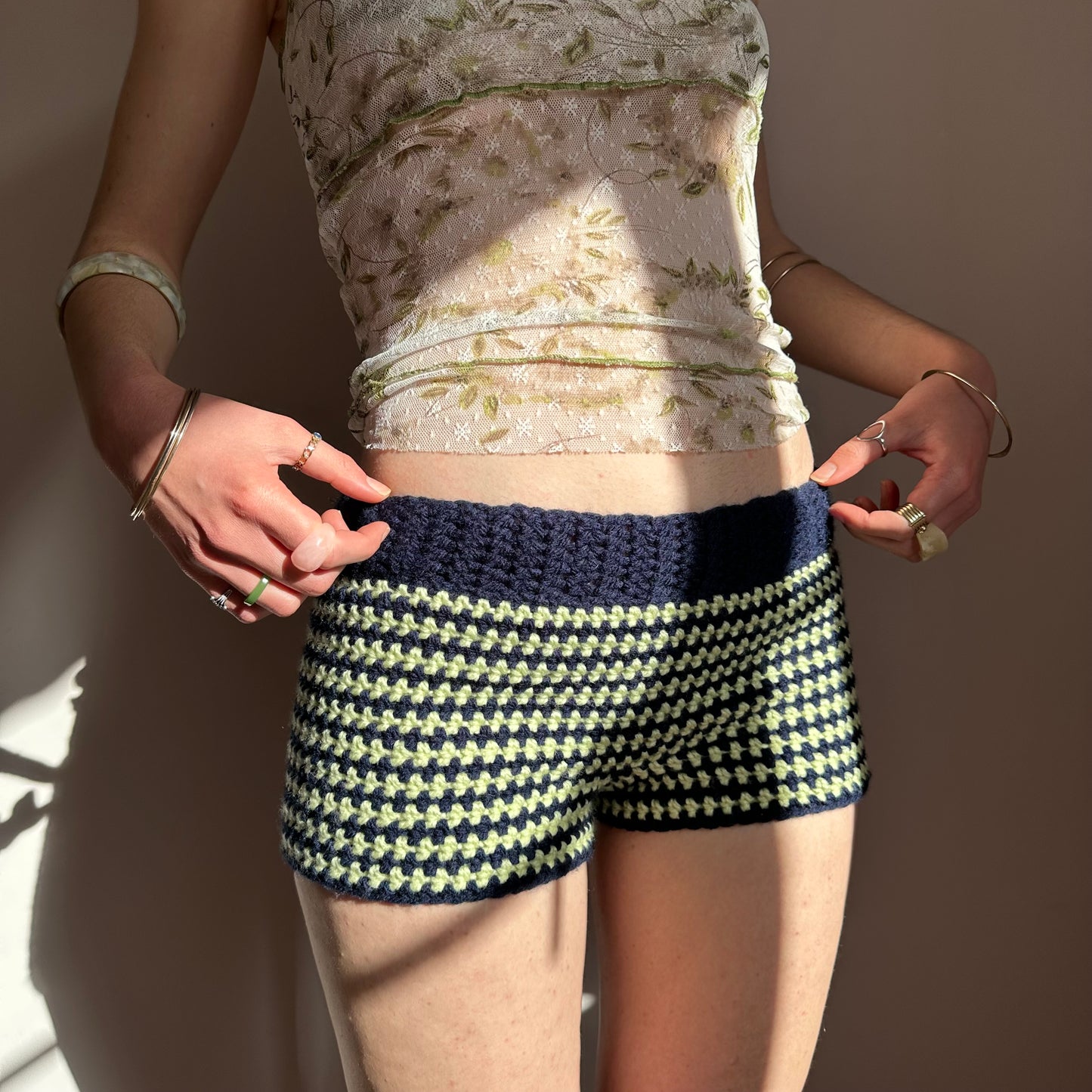 Handmade navy blue and light green striped crochet shorts