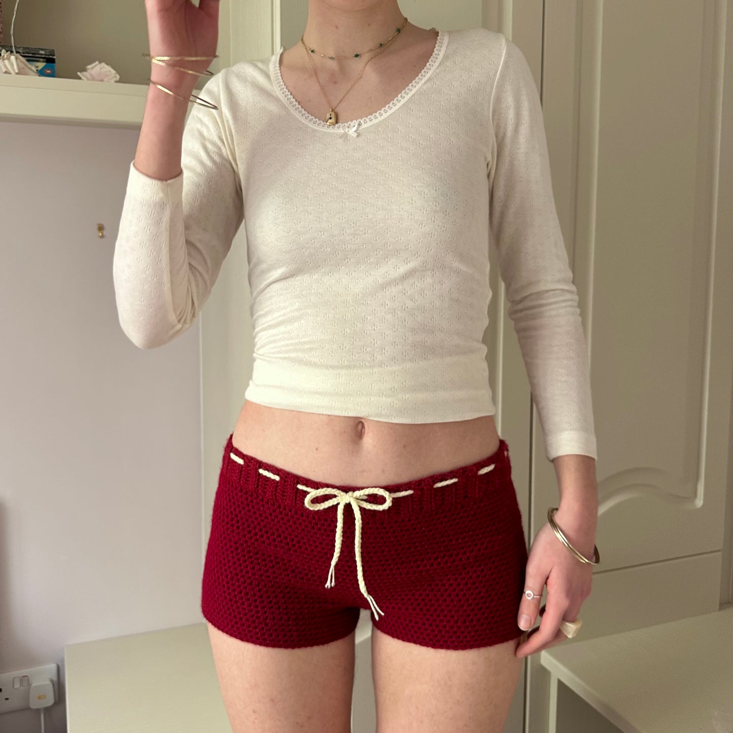 Handmade dark red crochet shorts with cream bow