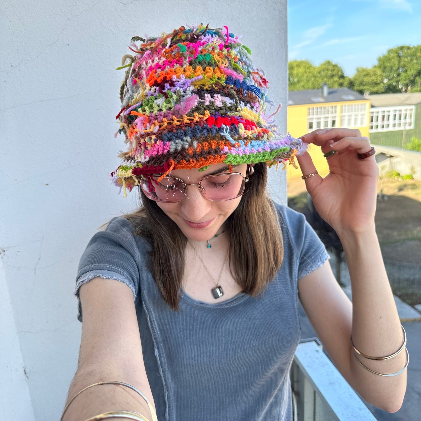 1 of 1 handmade crochet bucket hat made from leftover scraps of yarn