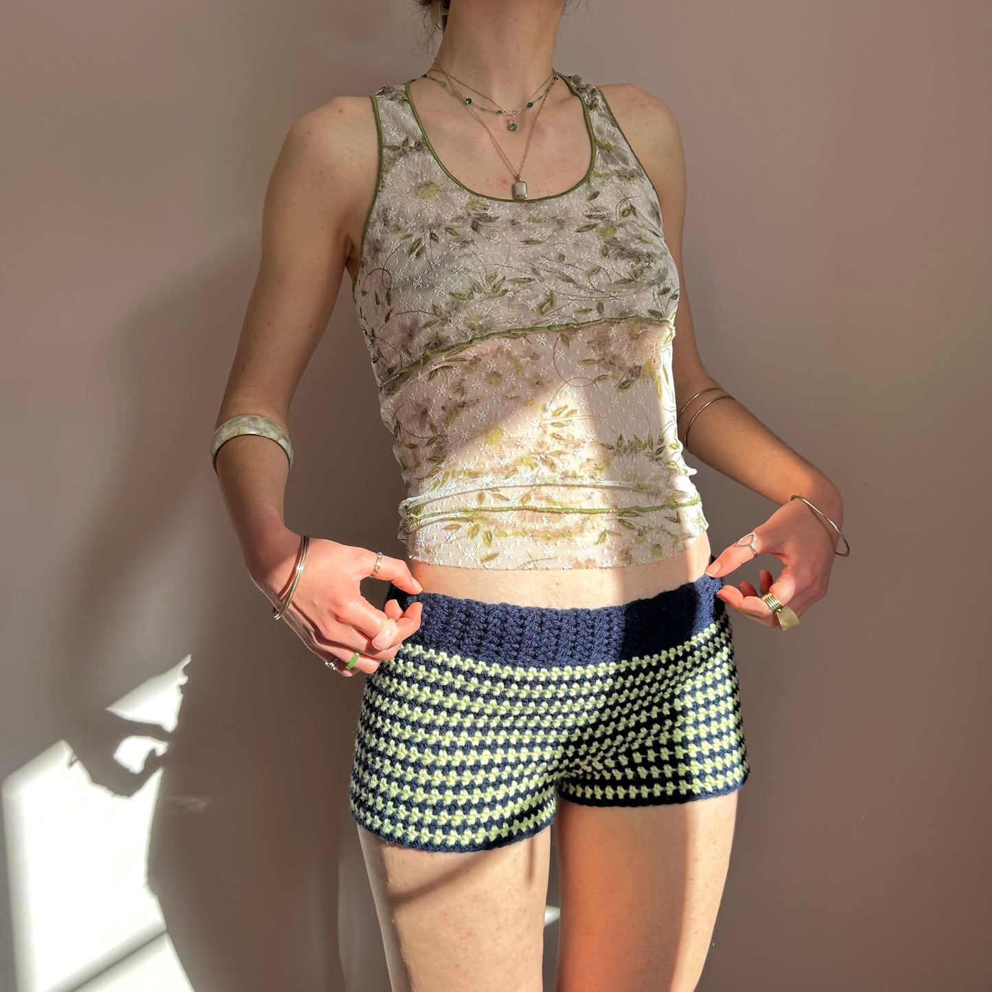 Handmade navy blue and light green striped crochet shorts