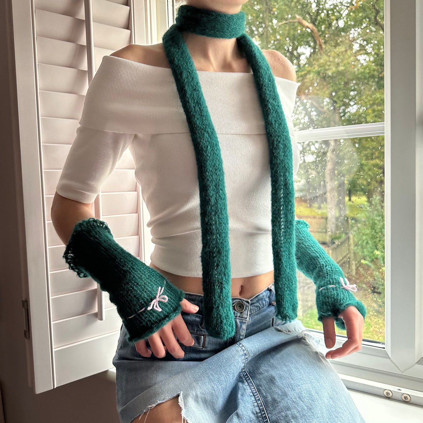 Handmade knitted mohair hand warmers in emerald green and baby pink - with thumb hole