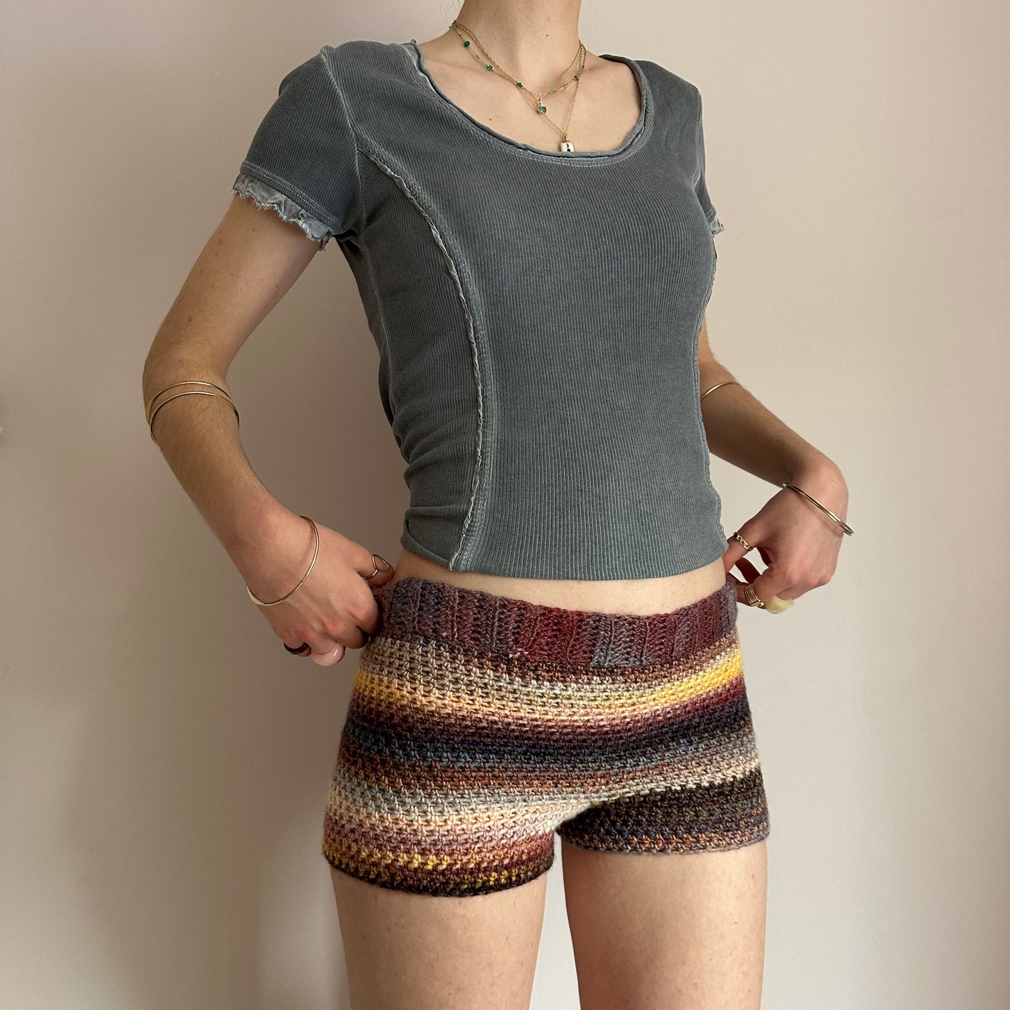 Handmade yellow, black, cream and burgundy ombré striped crochet shorts