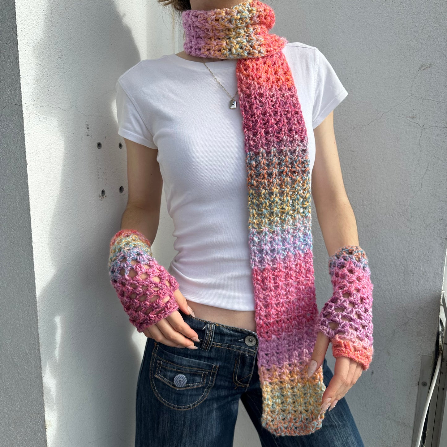 Handmade multicoloured ombré crochet scarf in pink, purple, orange and yellow