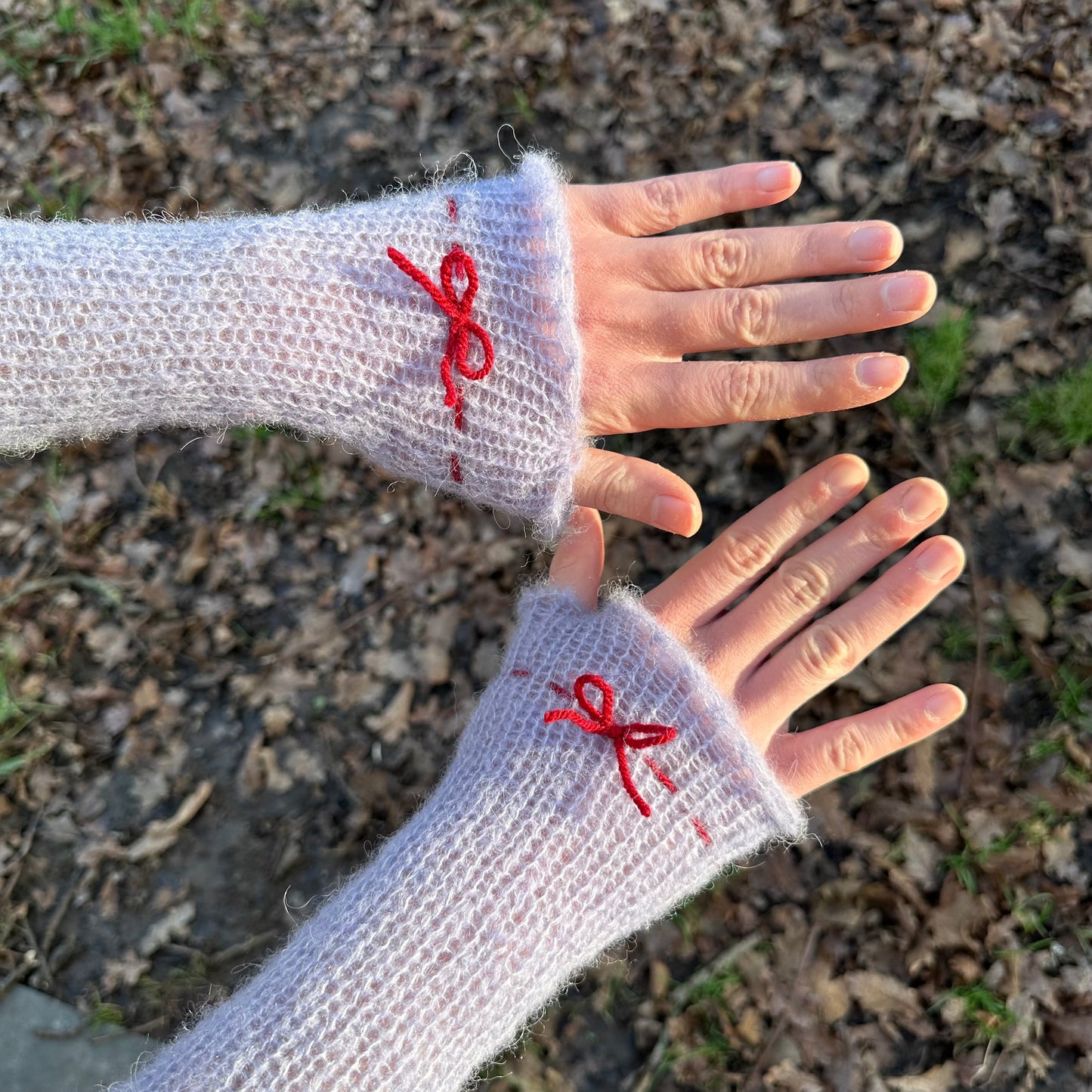 Handmade knitted mohair hand warmers in baby blue and red - with thumb hole
