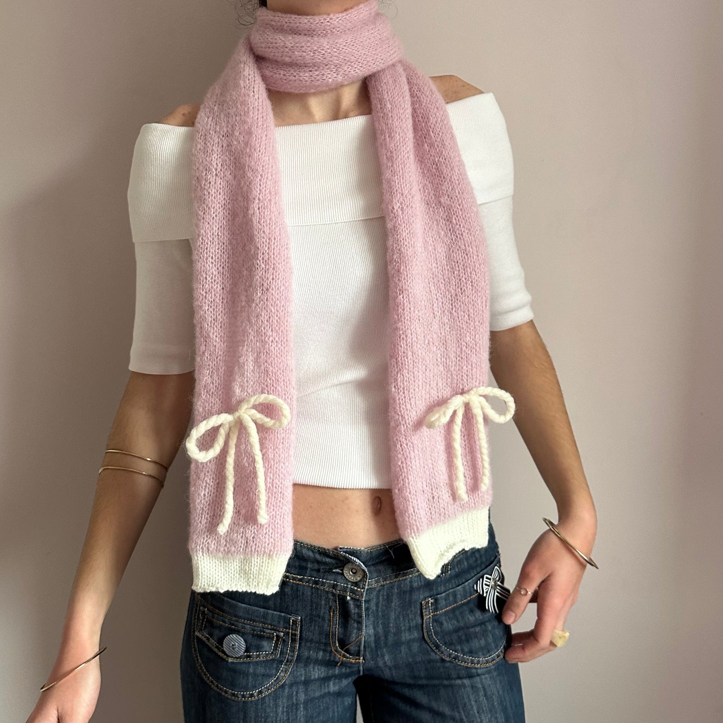 Handmade knitted baby pink and cream mohair bow scarf