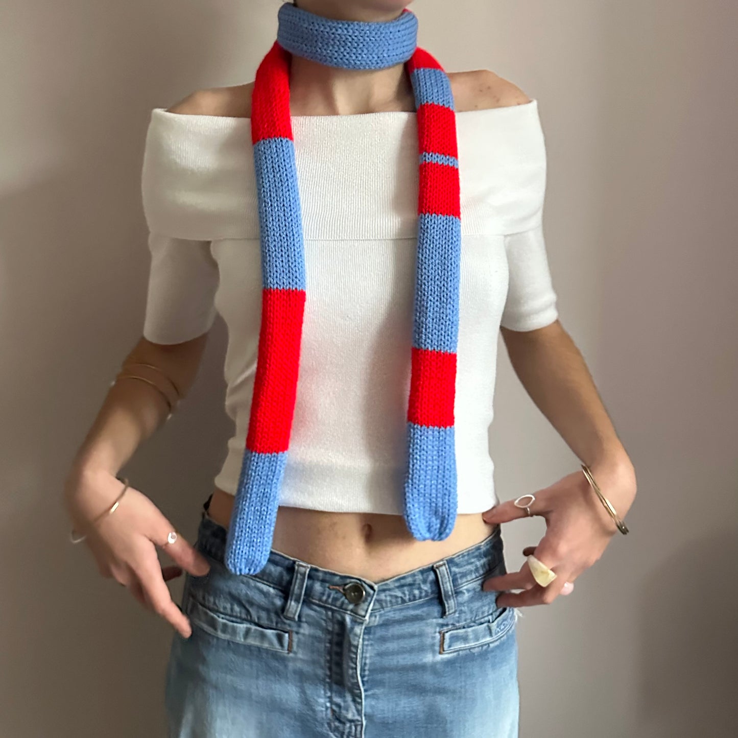 Handmade knitted stripy skinny scarf in red and blue