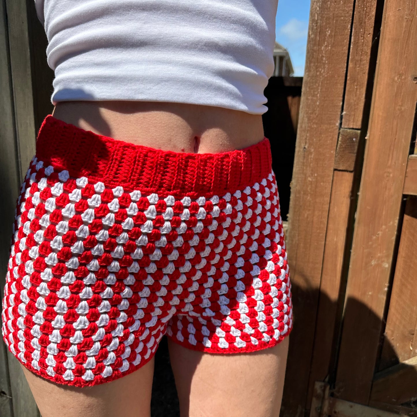 Handmade gingham crochet shorts in red and white