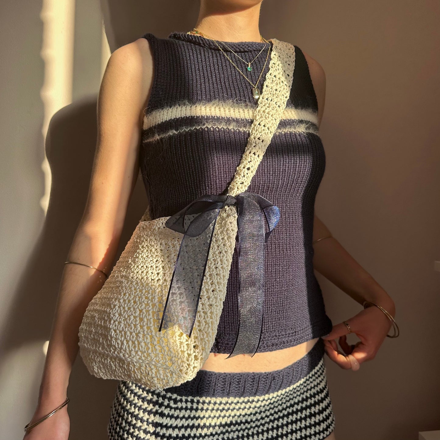 Handmade cream crochet straw bag with navy blue bow - can also be worn crossbody