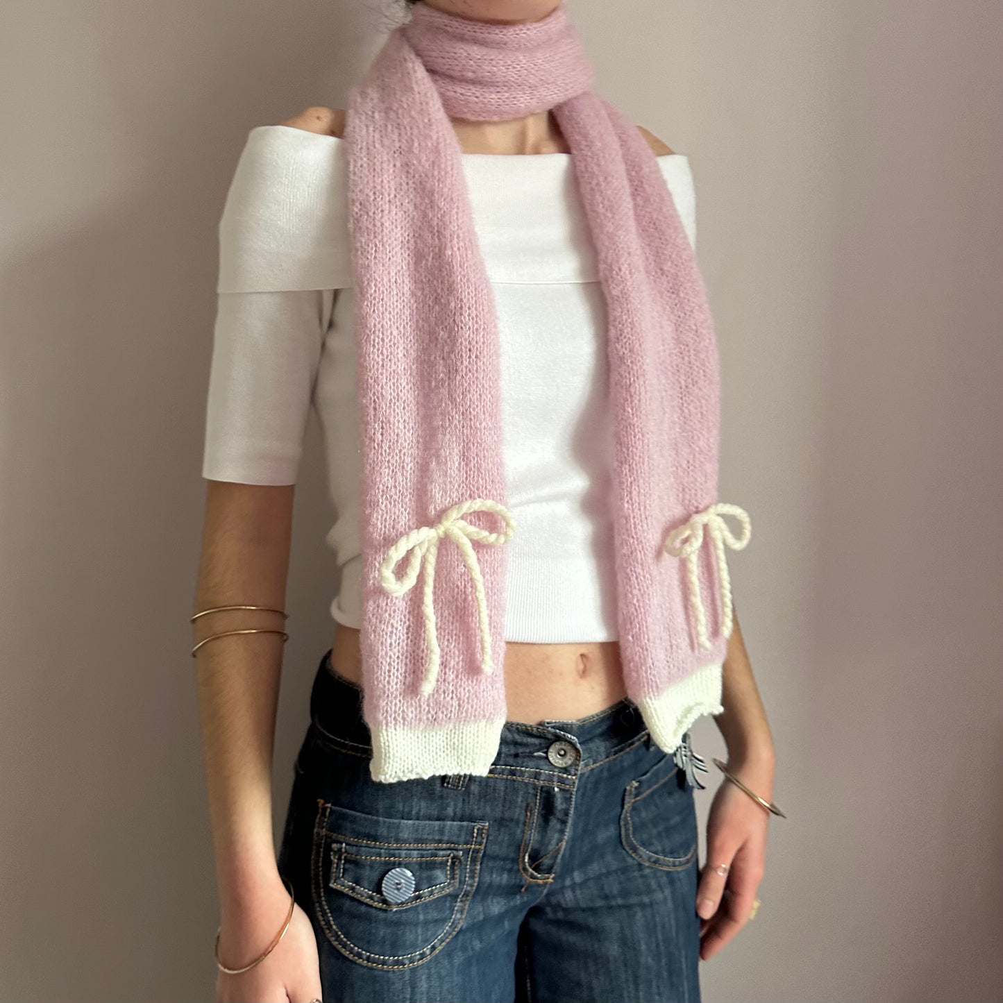 Handmade knitted baby pink and cream mohair bow scarf