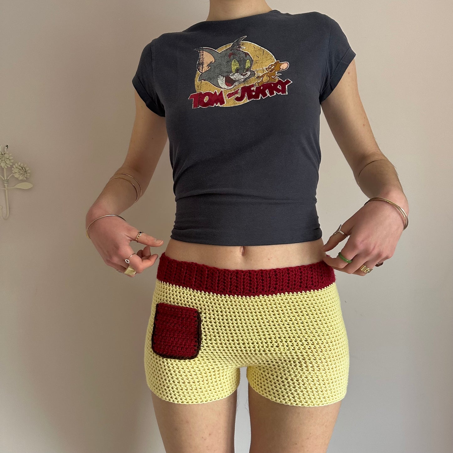 Handmade crochet shorts in pastel yellow, dark red and brown with pocket