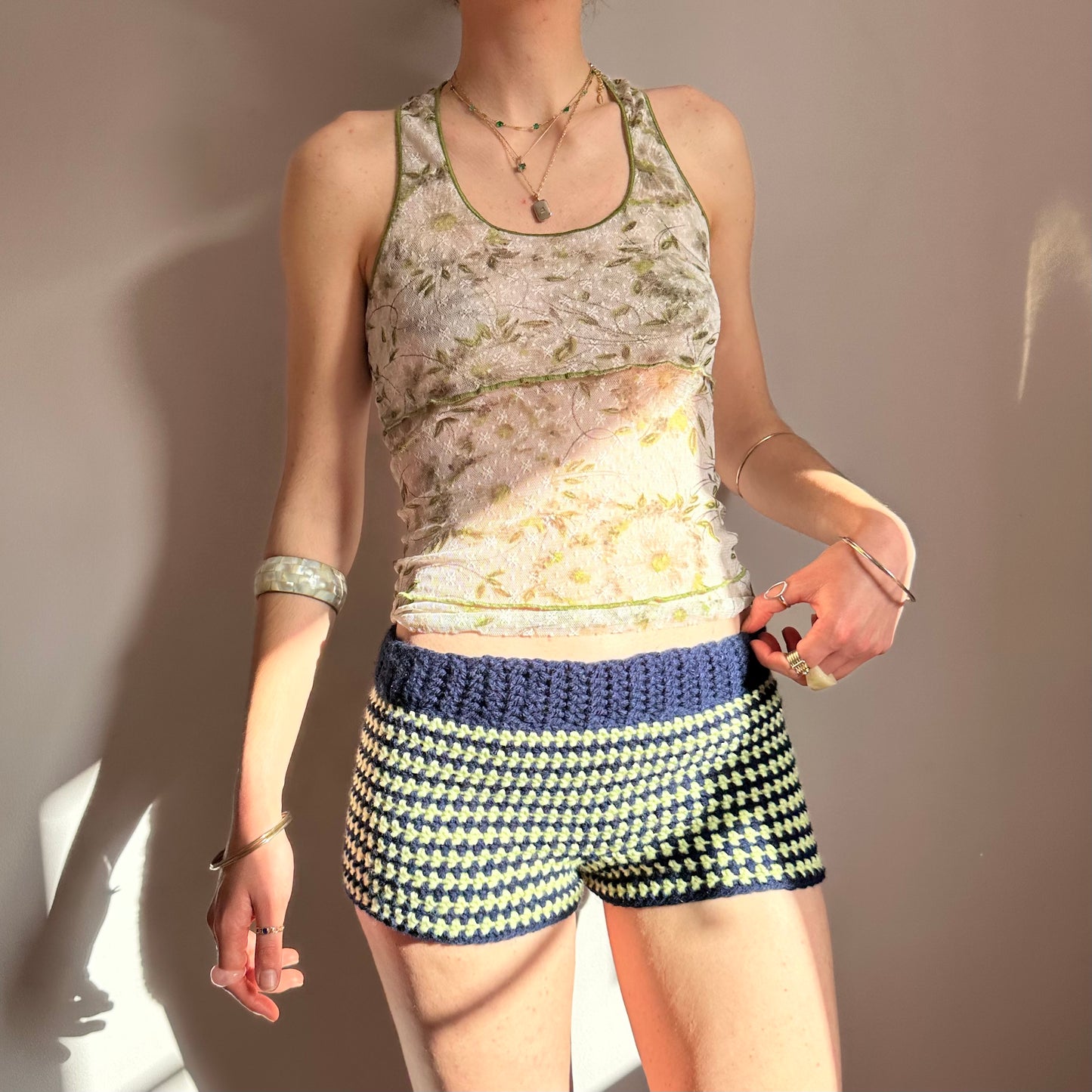 Handmade navy blue and light green striped crochet shorts