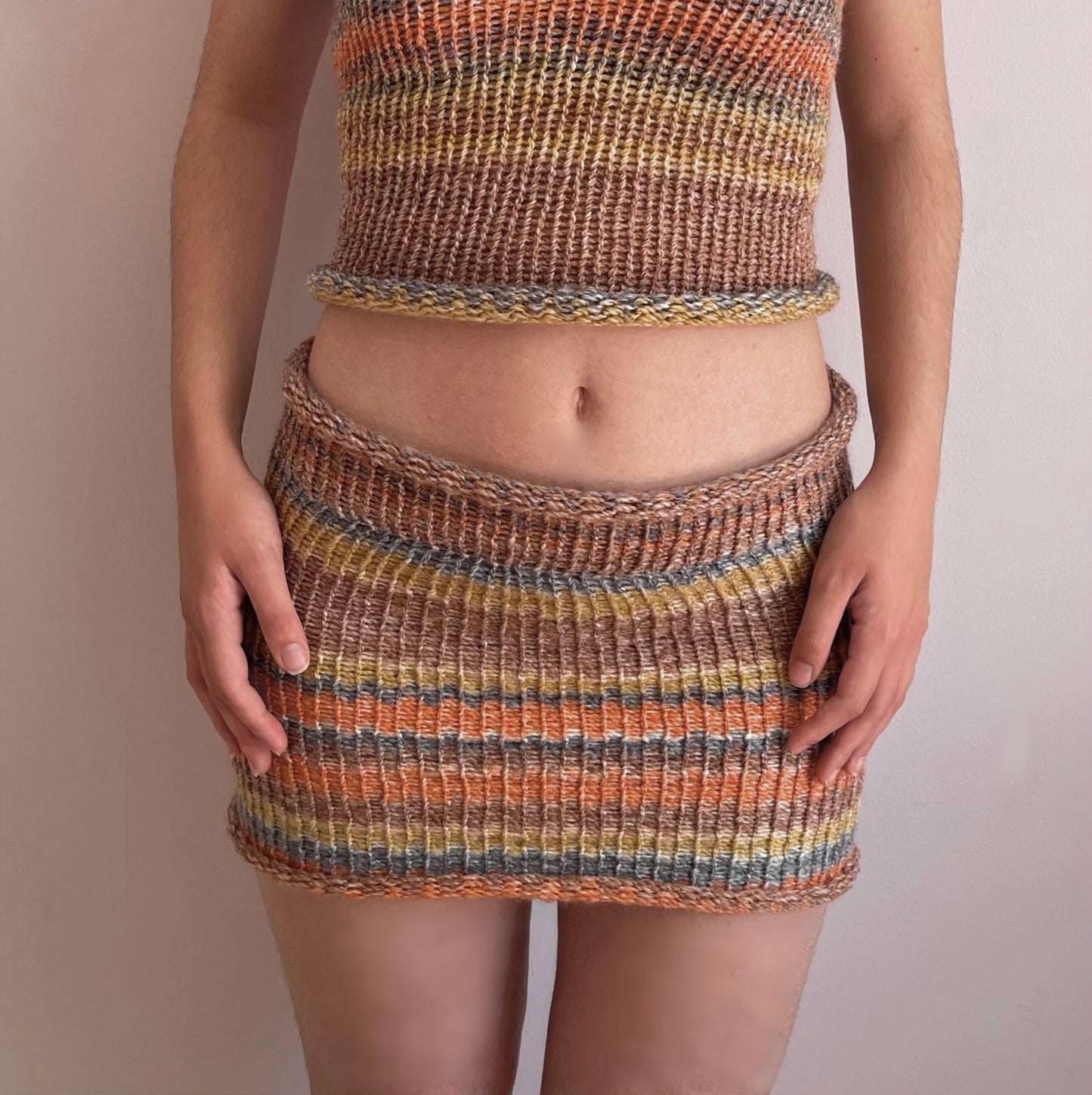 Handmade knitted mini skirt in orange, mustard yellow and grey