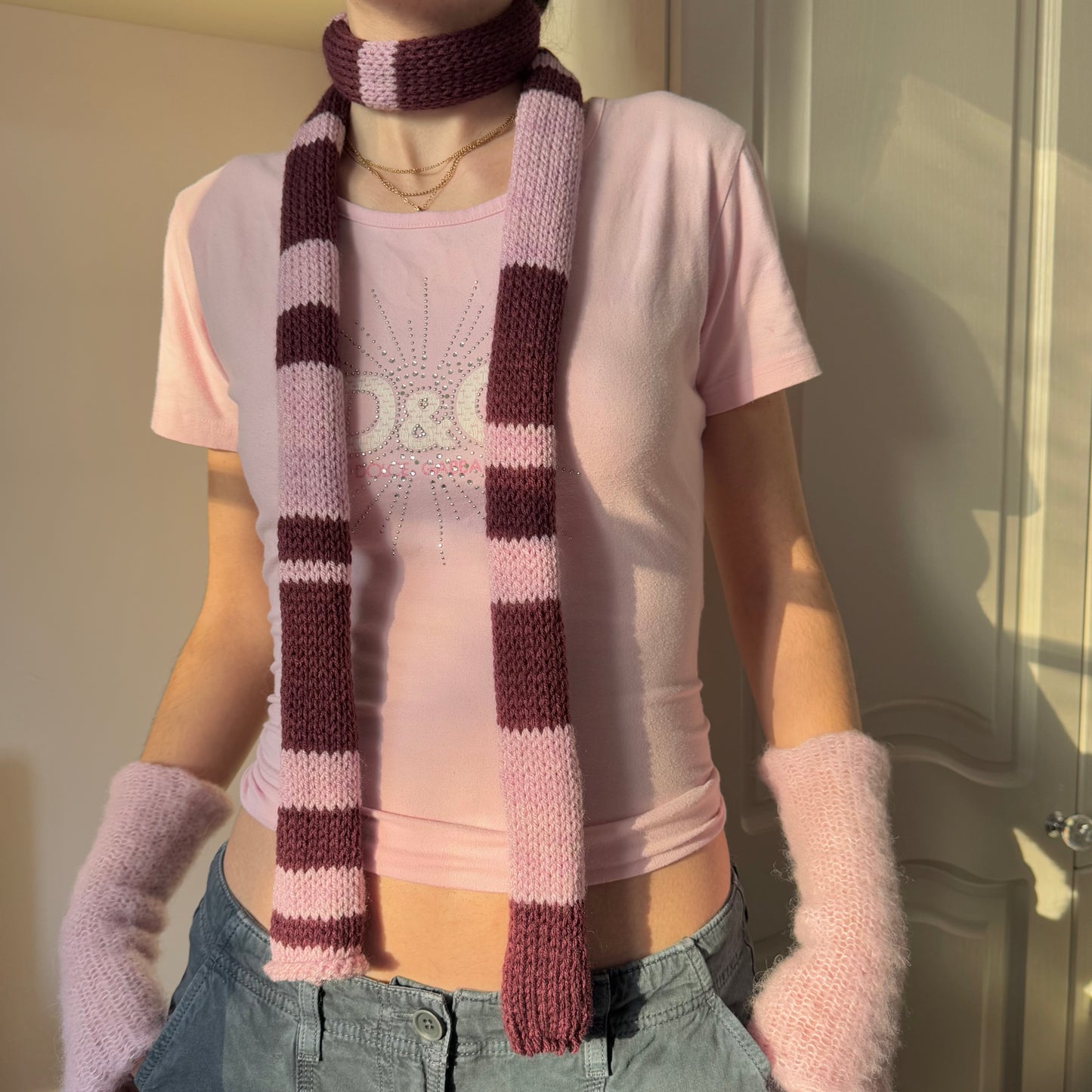 Handmade knitted stripy skinny scarf in maroon and dusky pink