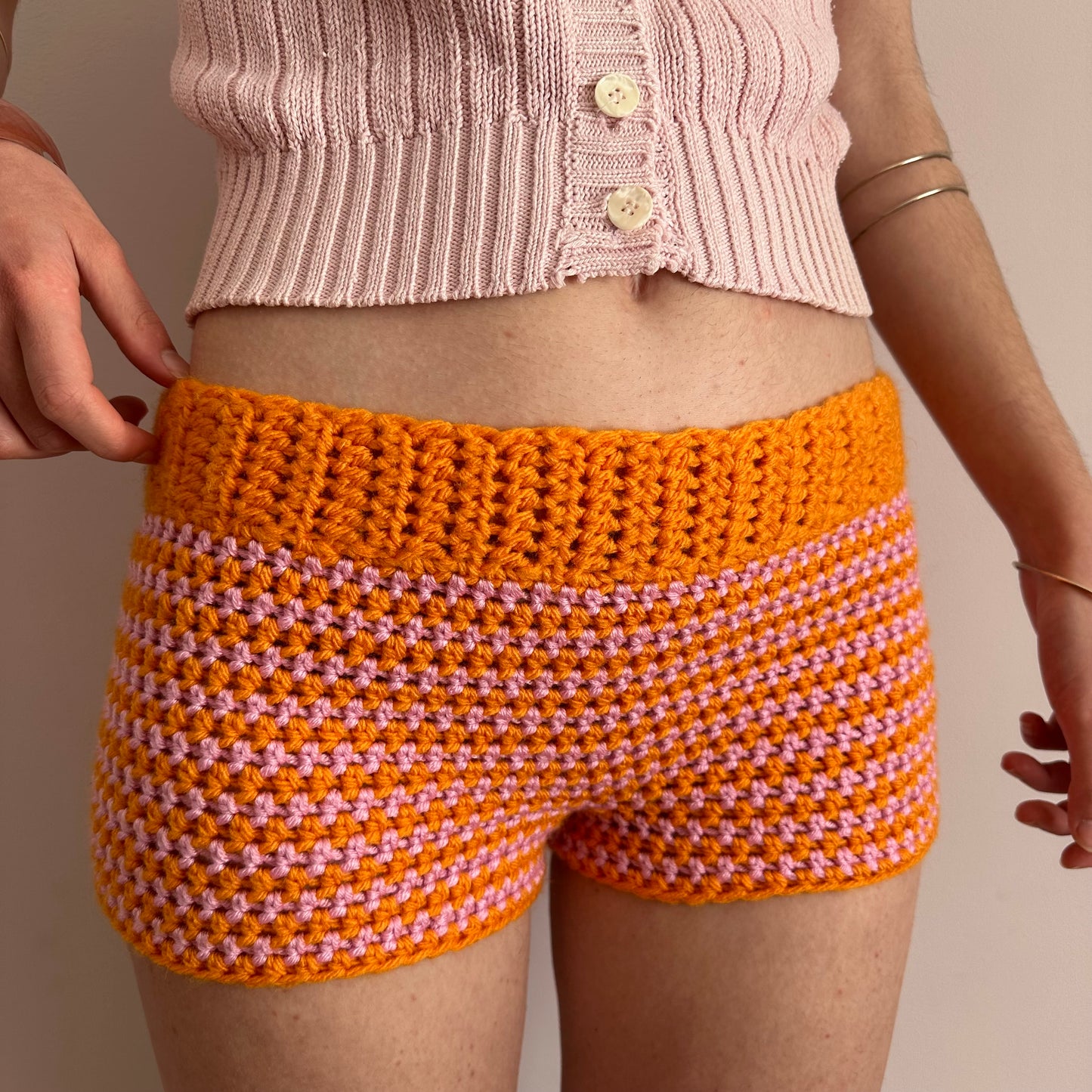 Handmade orange and pink striped crochet shorts