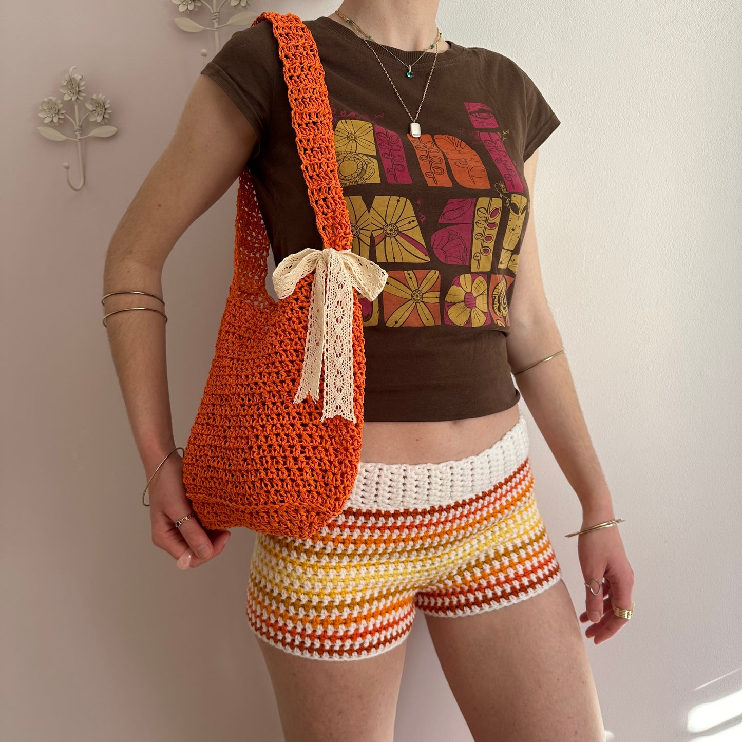 Handmade white, orange and yellow ombré striped crochet shorts