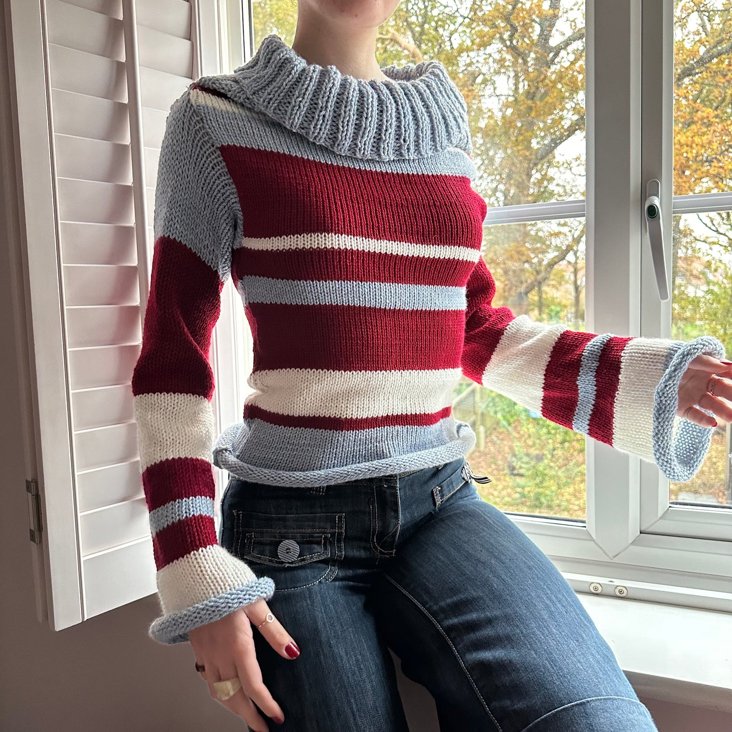 The Raya Jumper - striped cream, red and baby blue roll neck knitted jumper