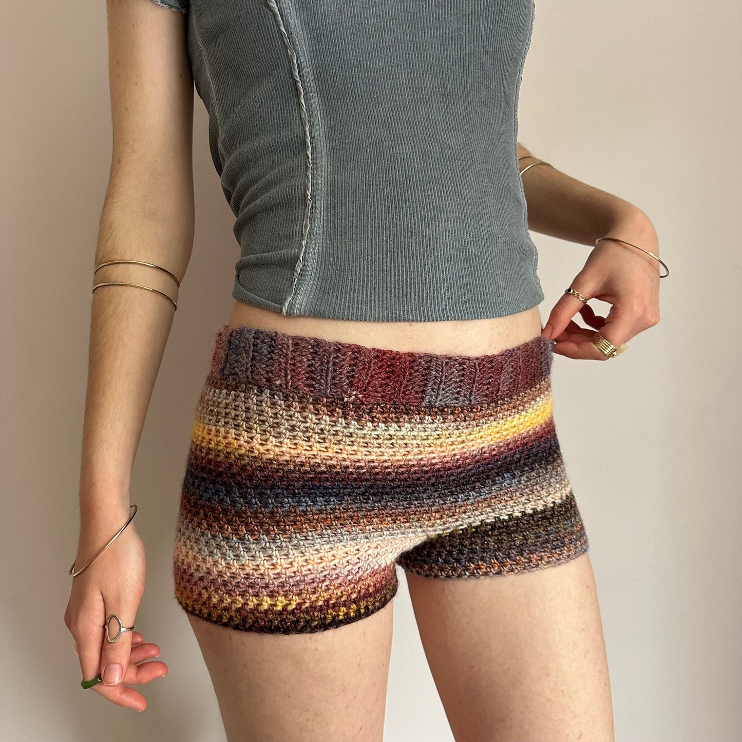 Handmade yellow, black, cream and burgundy ombré striped crochet shorts