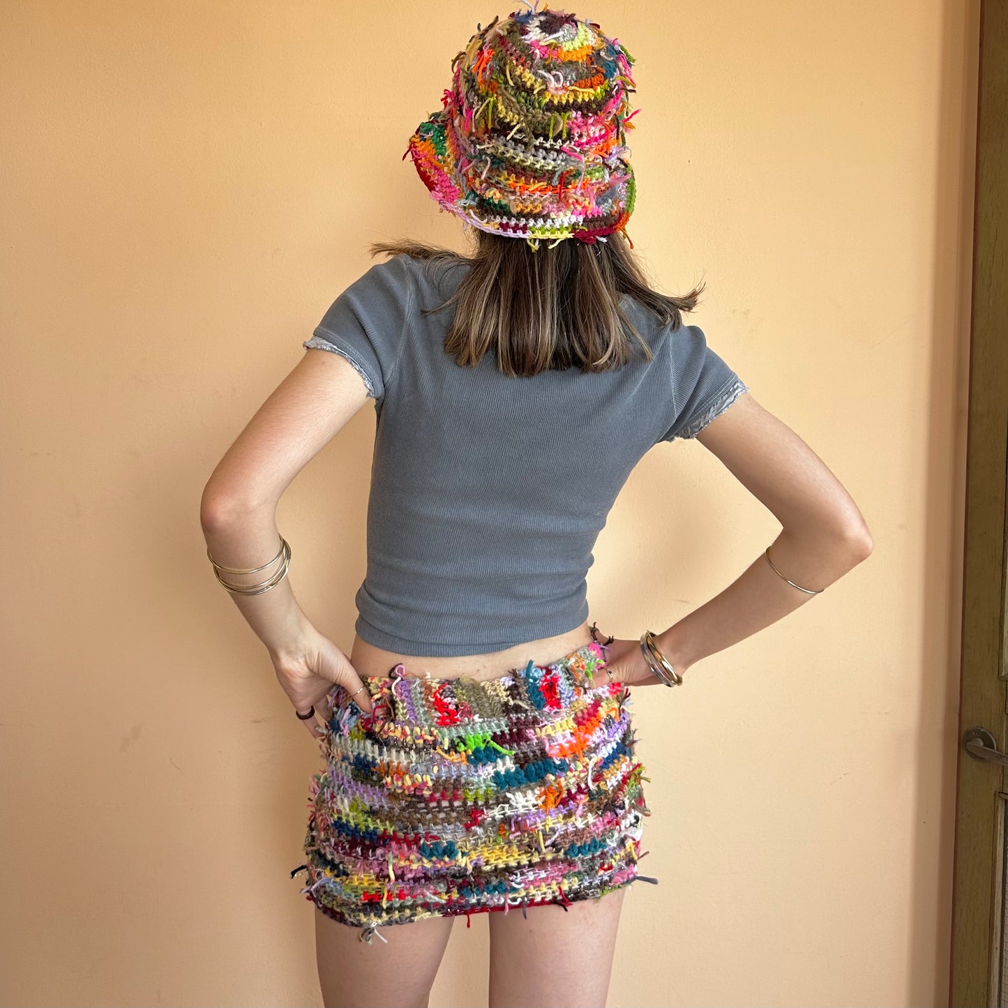 Handmade scrappy crochet mini skirt - 1 of 1, made of leftover yarn scraps