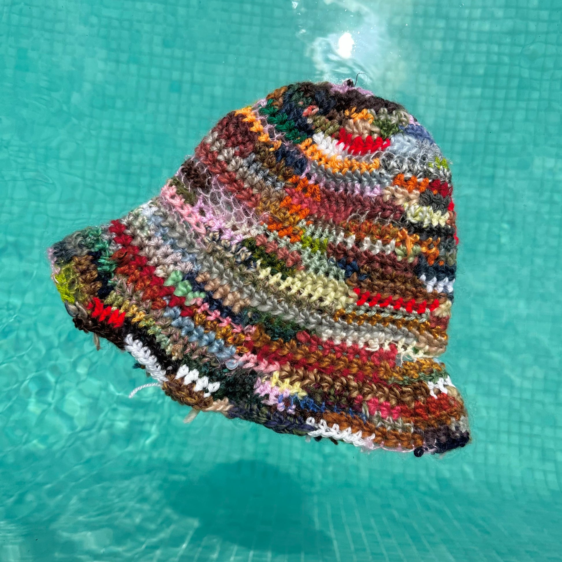 1 of 1 handmade crochet bucket hat made from leftover scraps of yarn