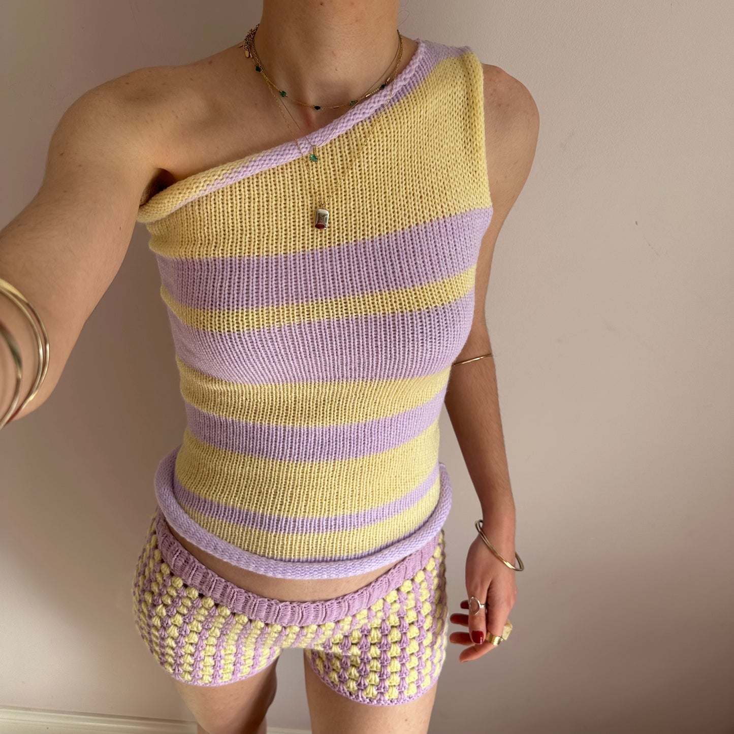 Handmade knitted striped one shoulder top in pastel yellow and lilac