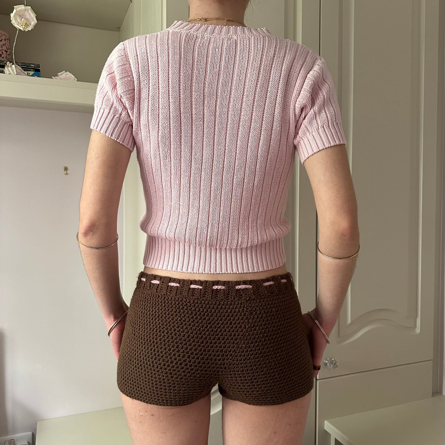 Handmade brown crochet shorts with baby pink bow