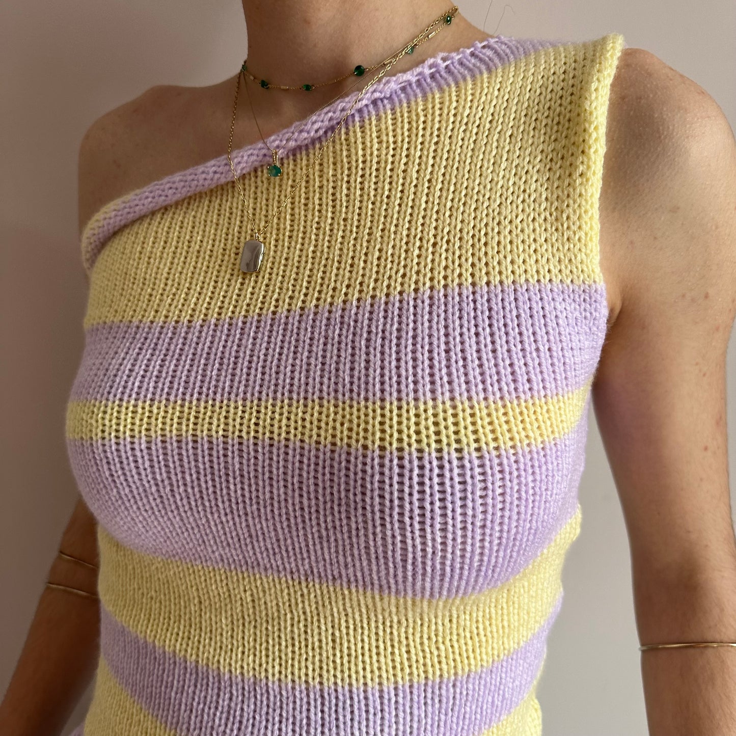 Handmade knitted striped one shoulder top in pastel yellow and lilac