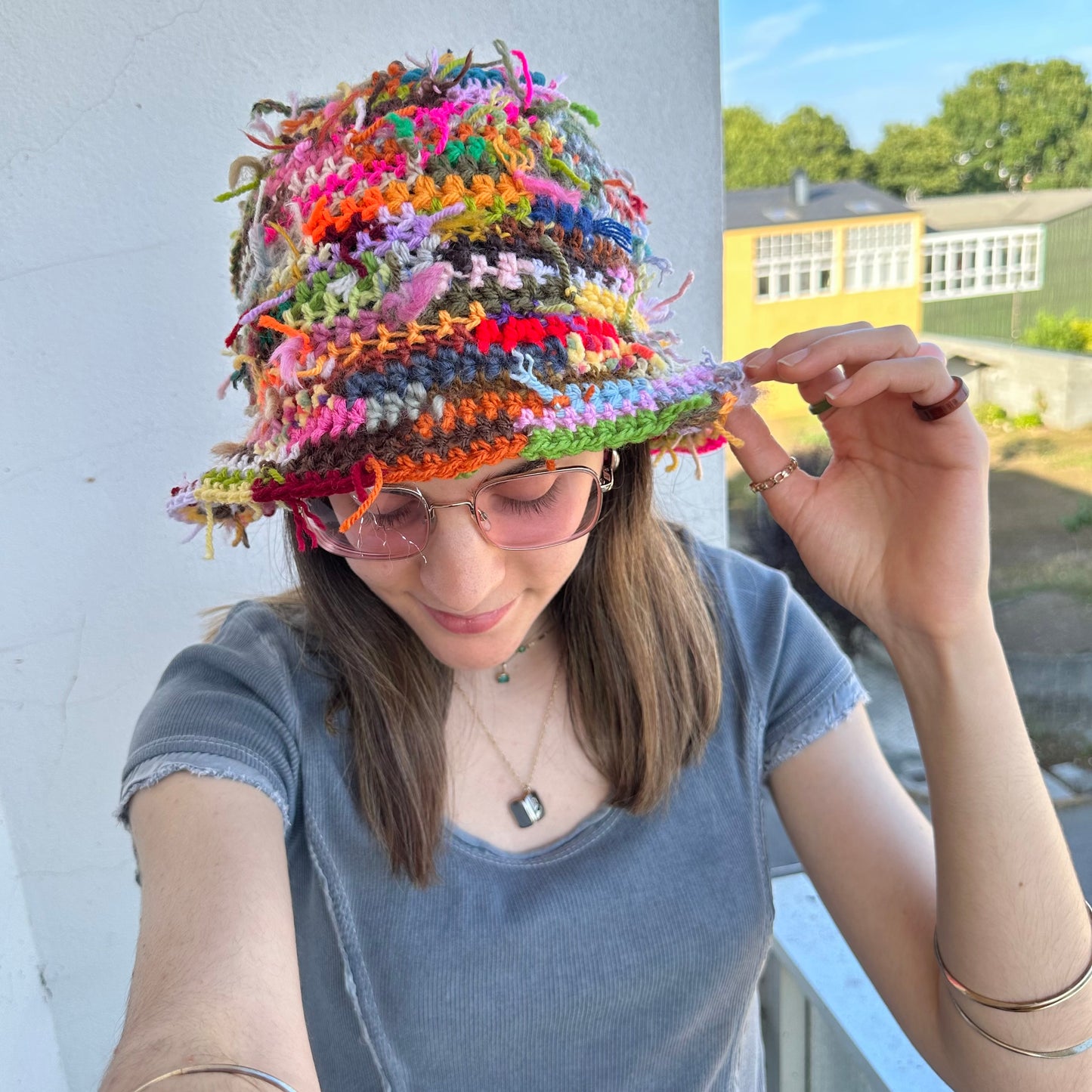 1 of 1 handmade crochet bucket hat made from leftover scraps of yarn