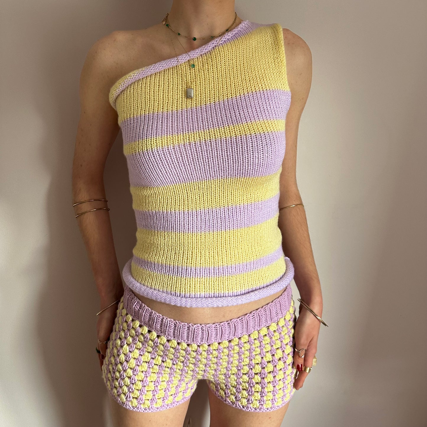 Handmade knitted striped one shoulder top in pastel yellow and lilac