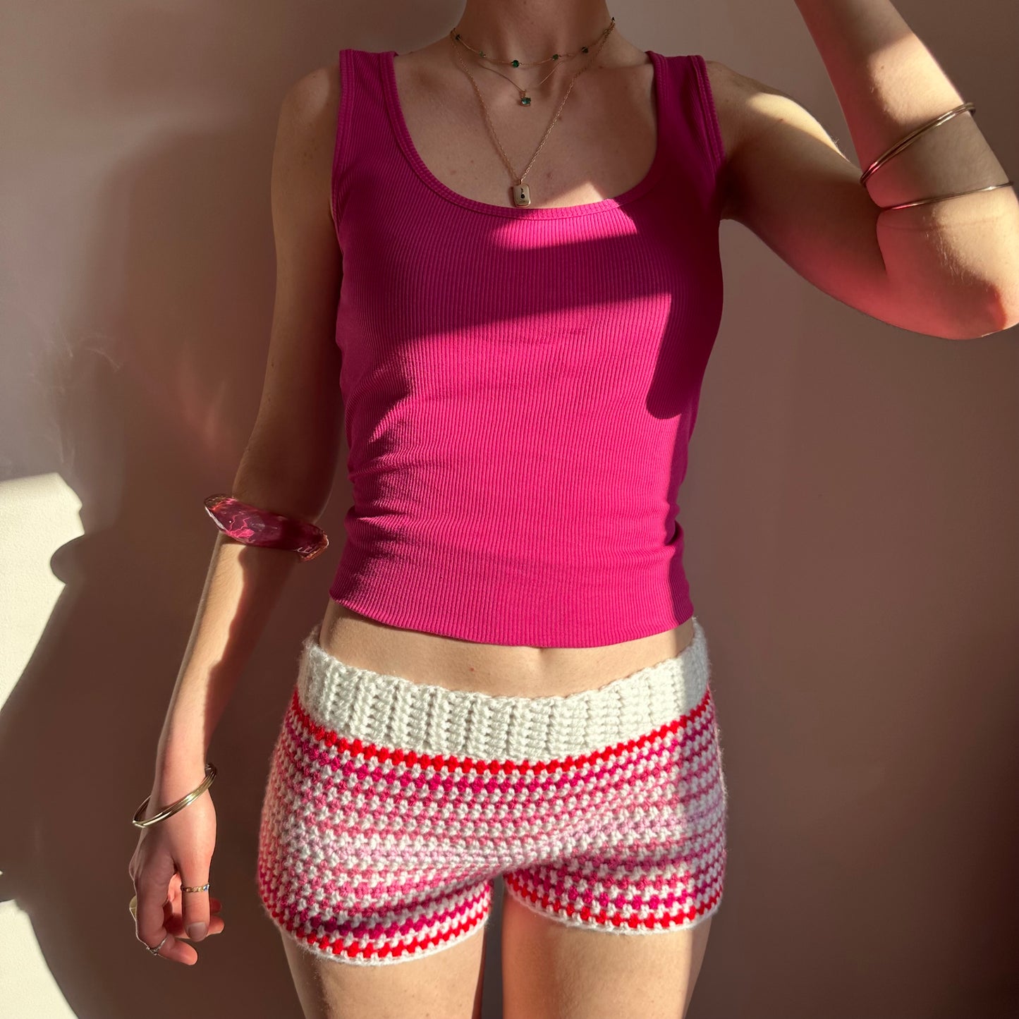 Handmade white and pink ombré striped crochet shorts