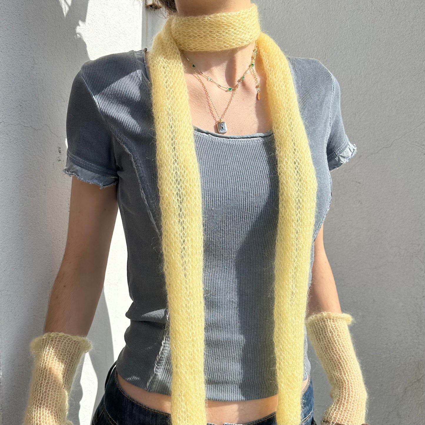 Handmade knitted mohair skinny scarf in light yellow