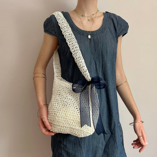 Handmade cream crochet straw bag with navy blue bow - can also be worn crossbody