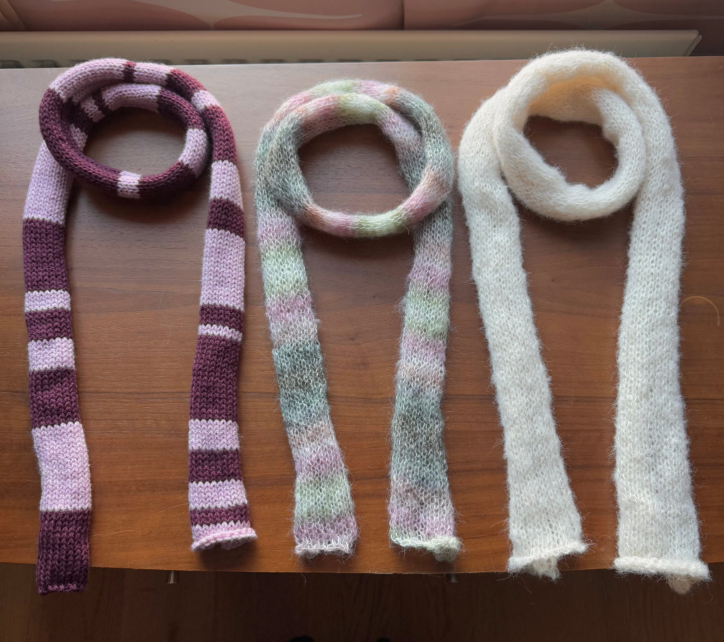 Handmade knitted stripy skinny scarf in maroon and dusky pink