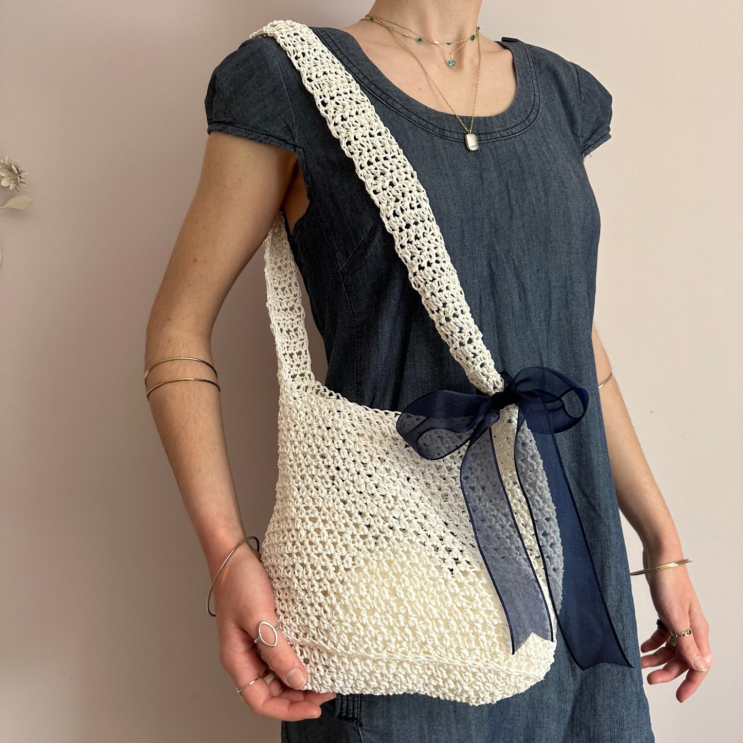 Handmade cream crochet straw bag with navy blue bow - can also be worn crossbody