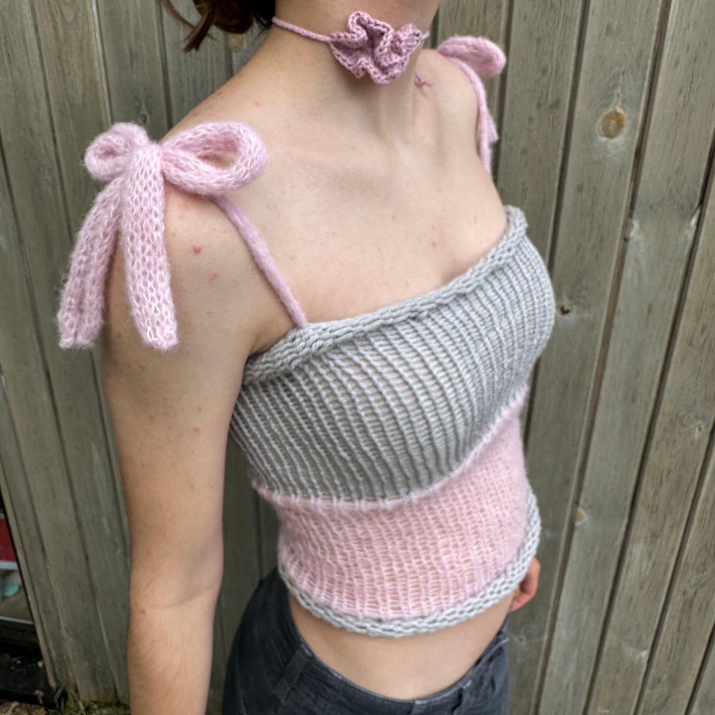 Handmade knitted mohair bow top in light grey and baby pink