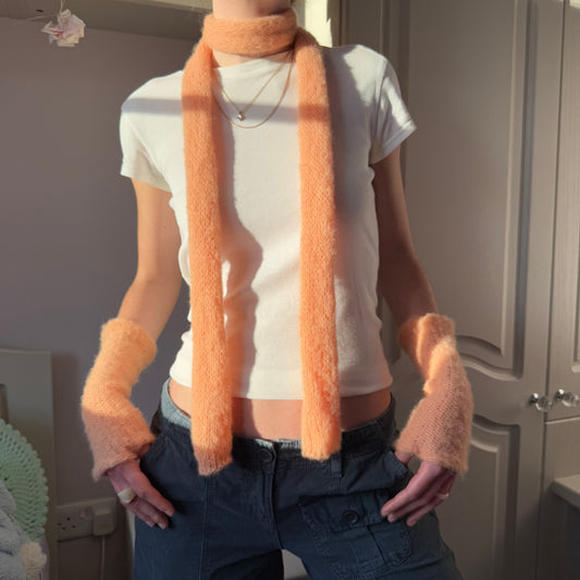 Handmade knitted mohair skinny scarf in light orange