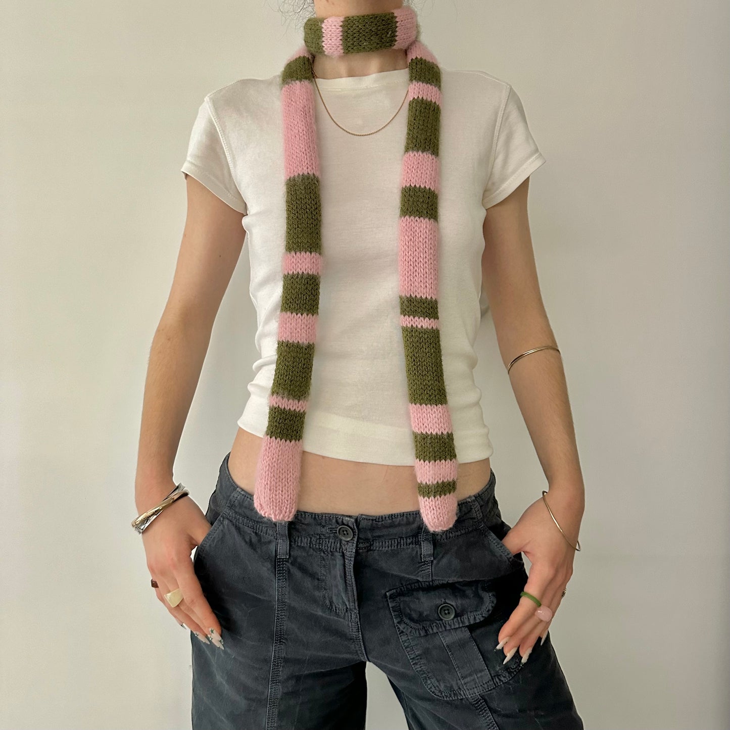 Handmade knitted stripy skinny scarf in dusky pink and khaki green