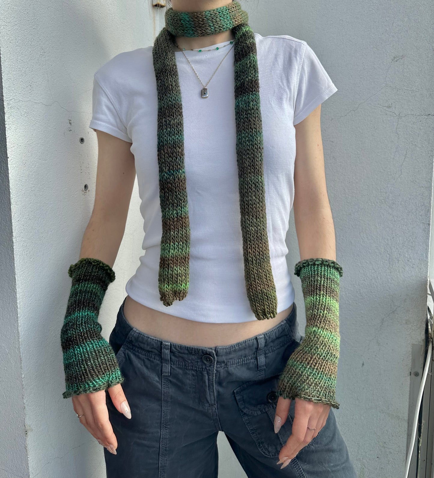 Handmade knitted ombré green hand warmers