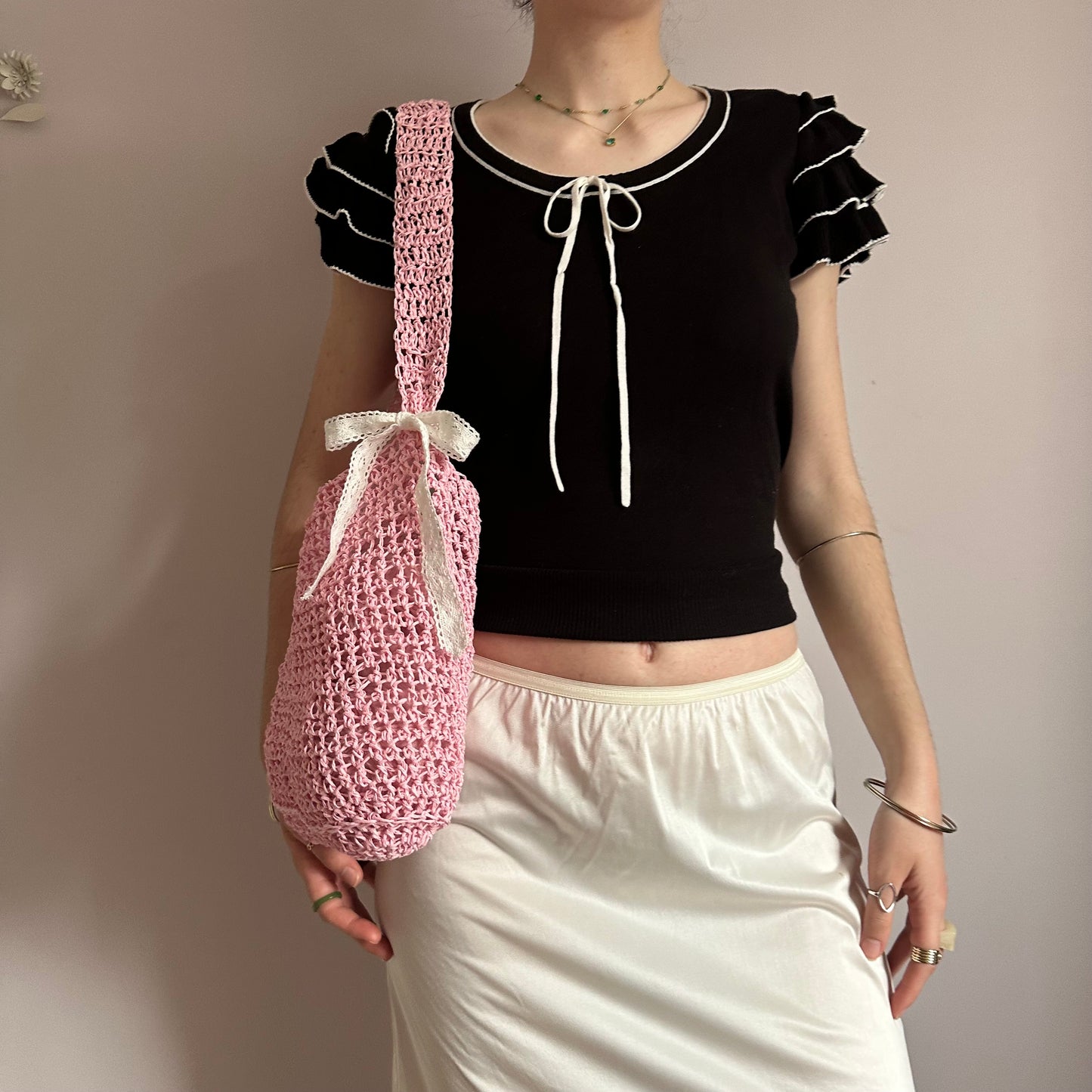 Handmade baby pink crochet straw bag with white lace bow