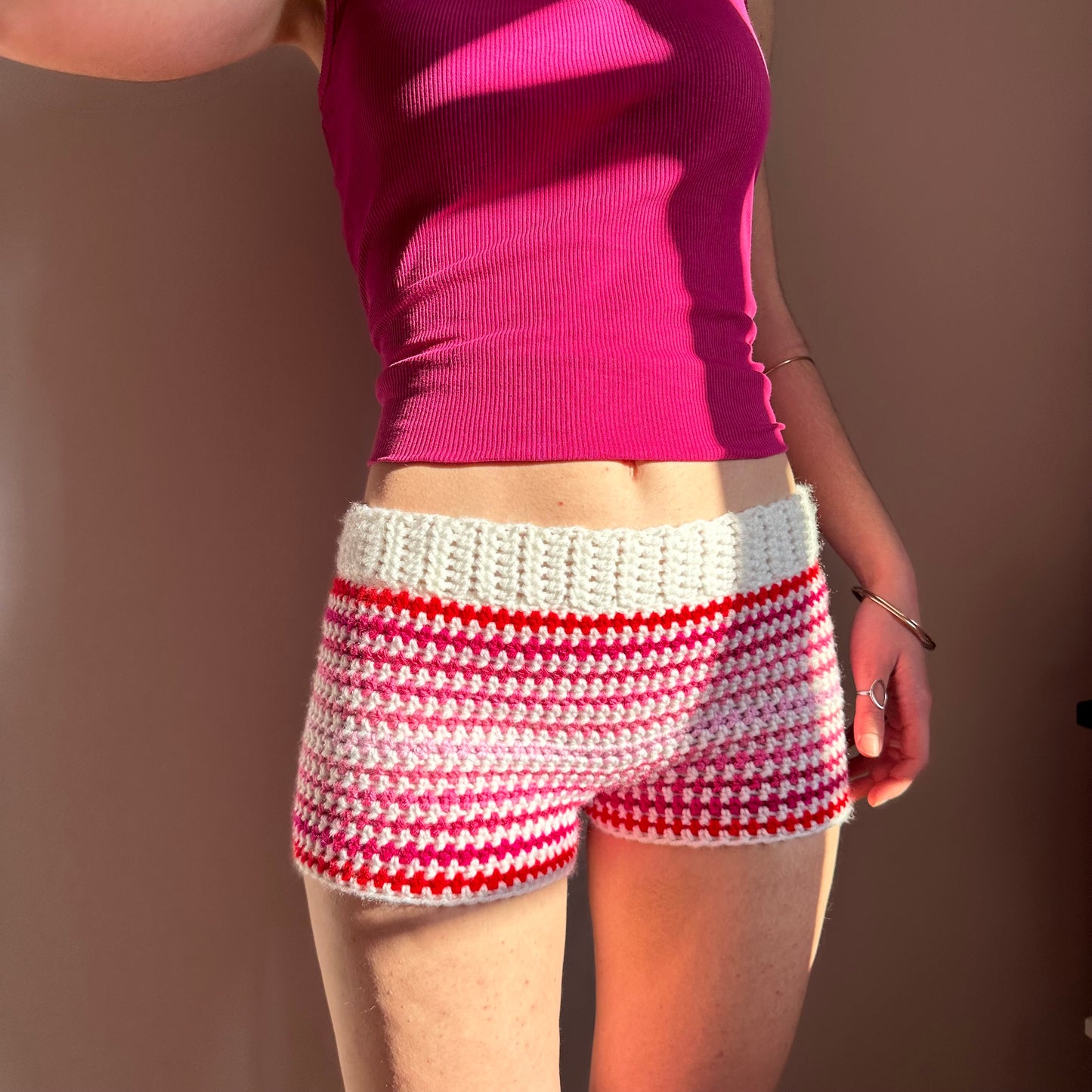 Handmade white and pink ombré striped crochet shorts