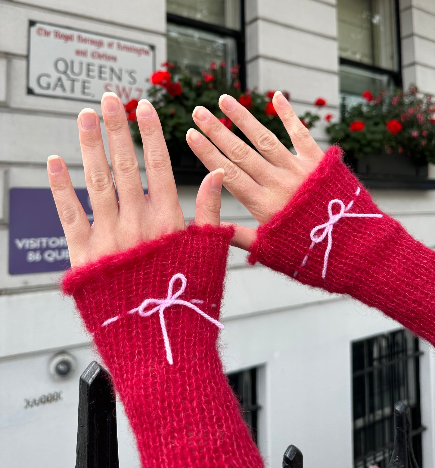 Handmade knitted mohair hand warmers in red & baby pink - with thumb hole