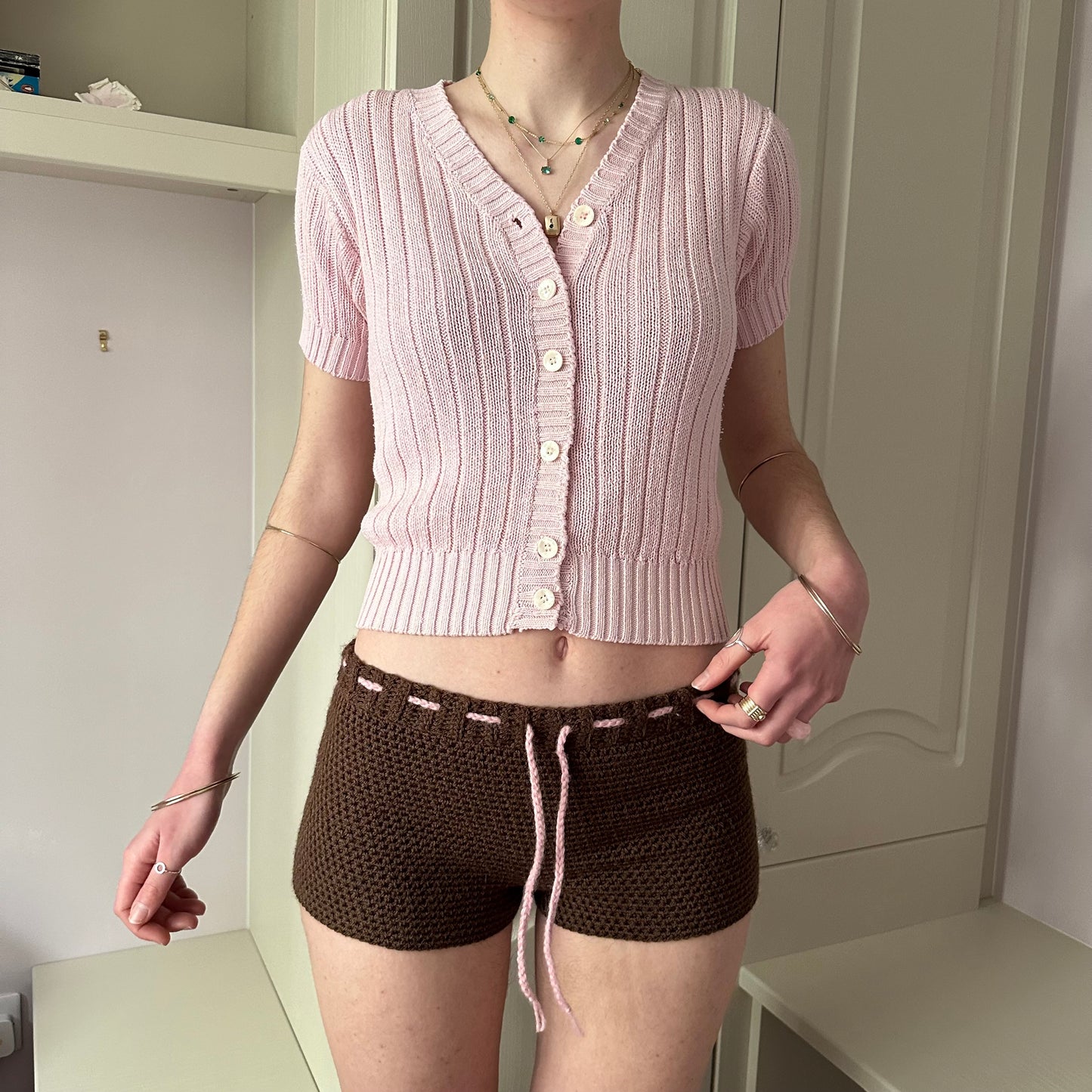 Handmade brown crochet shorts with baby pink bow