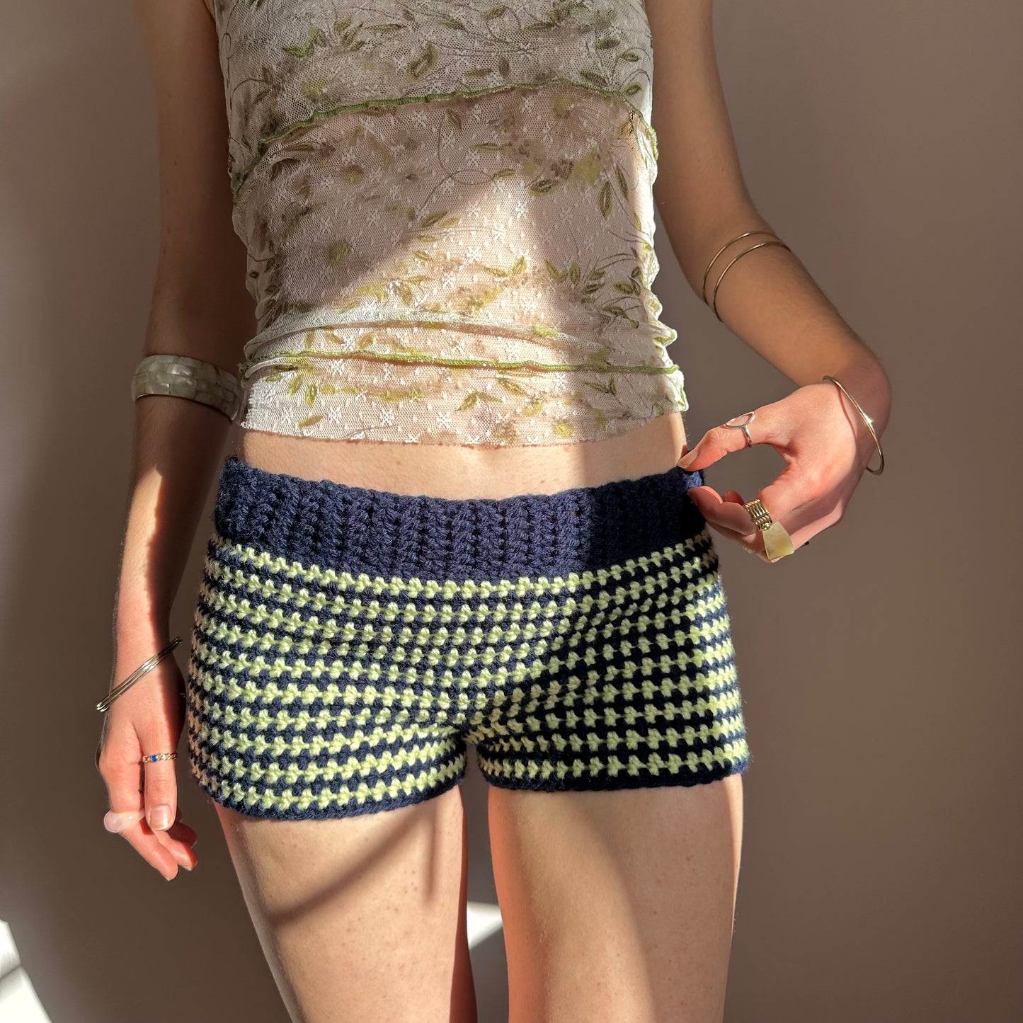 Handmade navy blue and light green striped crochet shorts