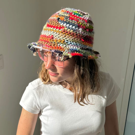 1 of 1 handmade crochet bucket hat made from leftover scraps of yarn