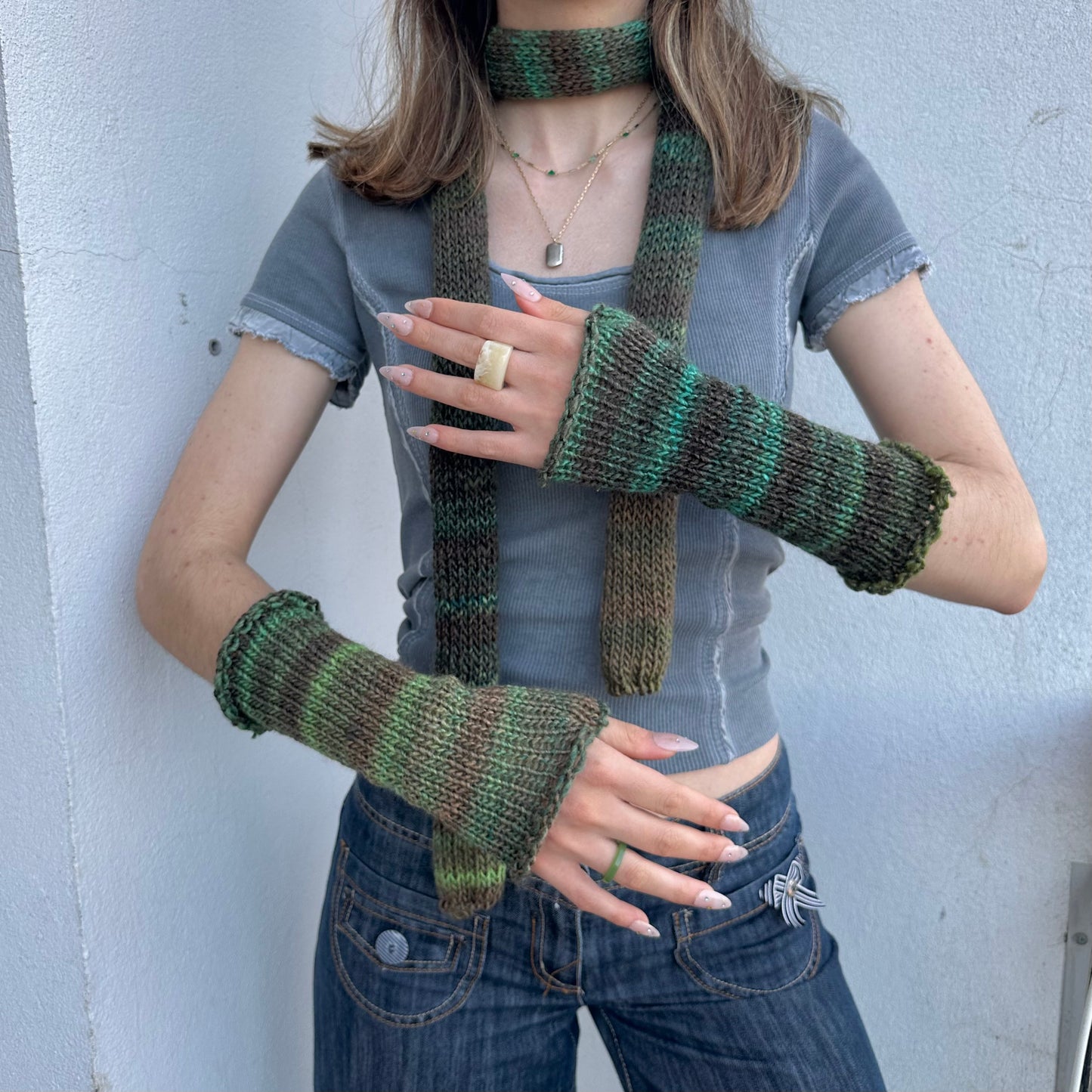 Handmade knitted ombré green hand warmers